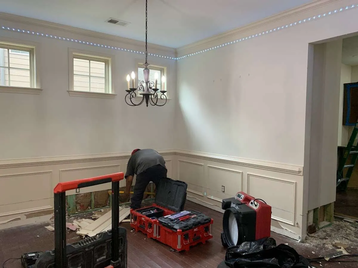 Restoration technician with professional equipment in Butner